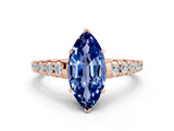 Rose gold Marquise Cut Blue Sapphire Solitaire Ring with Cathedral Setting and Pavé Band