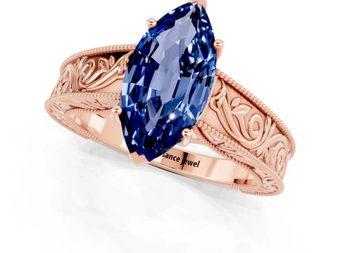 Rose gold Marquise Cut Blue Sapphire Solitaire Ring with Engraved Band and Four-Prong Setting_1
