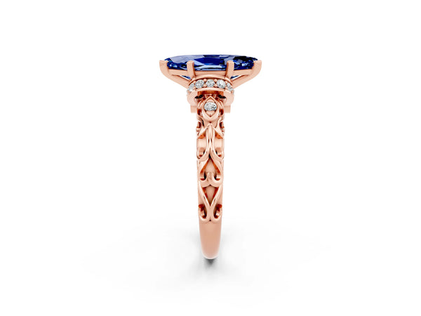 Rose gold Marquise Cut Blue Sapphire Solitaire Ring with Filigree Band and Four-Prong Setting
