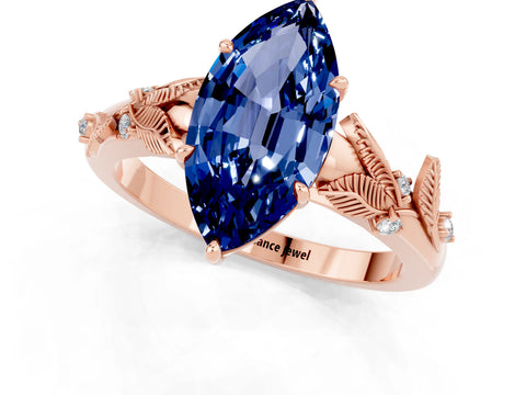 Rose gold Marquise Cut Blue Sapphire Solitaire Ring with Leaf Motif Band and Four-Prong Setting_1