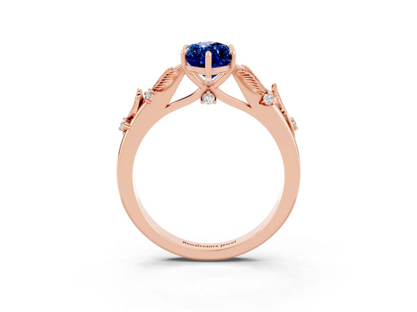 Rose gold Marquise Cut Blue Sapphire Solitaire Ring with Leaf Motif Band and Four-Prong Setting