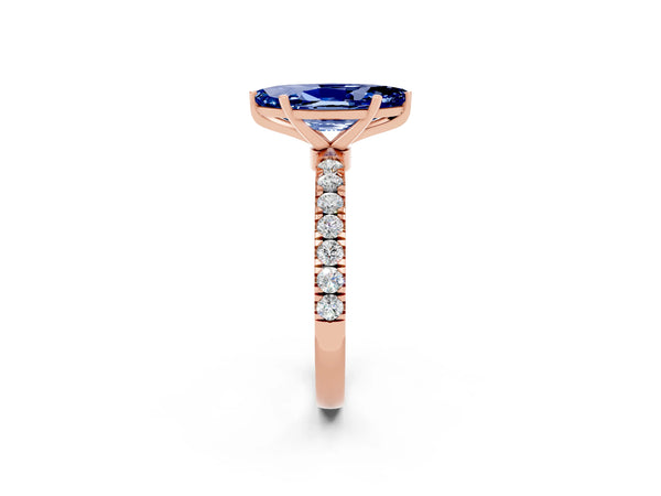 Rose gold Marquise Cut Blue Sapphire Solitaire Ring with Pavé Accents and Four-Prong Setting