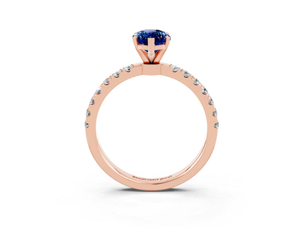 Rose gold Marquise Cut Blue Sapphire Solitaire Ring with Pavé Accents and Four-Prong Setting