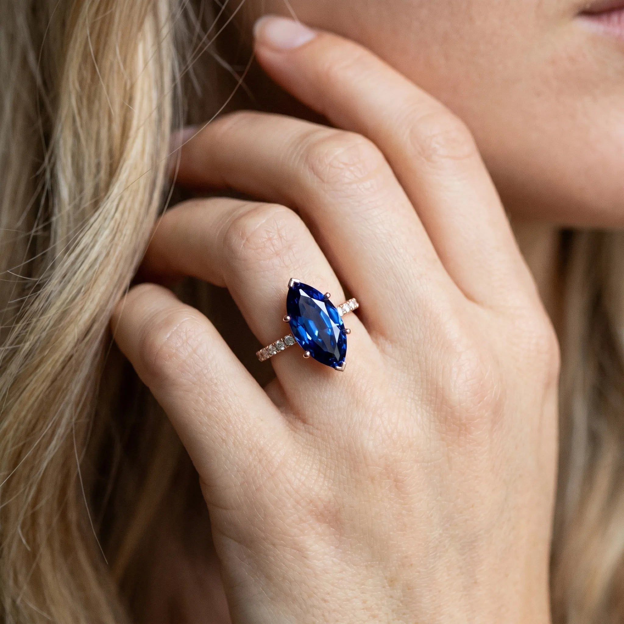 Rose gold Marquise Cut Blue Sapphire Solitaire Ring with Round  Pavé Band and Four-Prong Setting_44