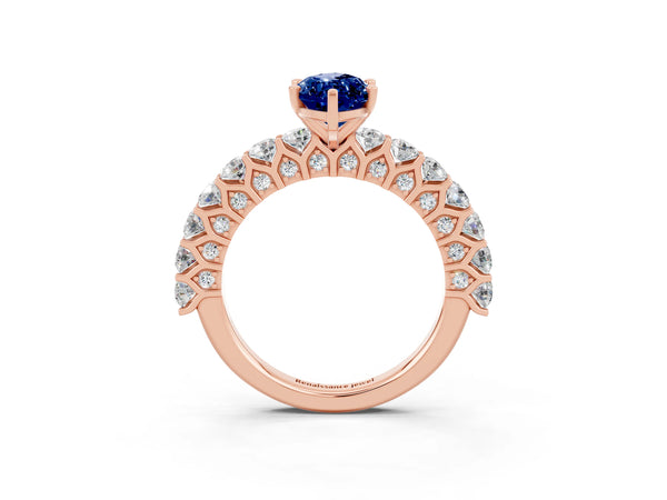 Rose gold Marquise Cut Blue Sapphire Solitaire Ring with Shared Prong Pavé Band and Four-Prong Setting