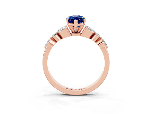 Rose gold Marquise Cut Blue Sapphire Solitaire Ring with Side Stones and Four-Prong Setting