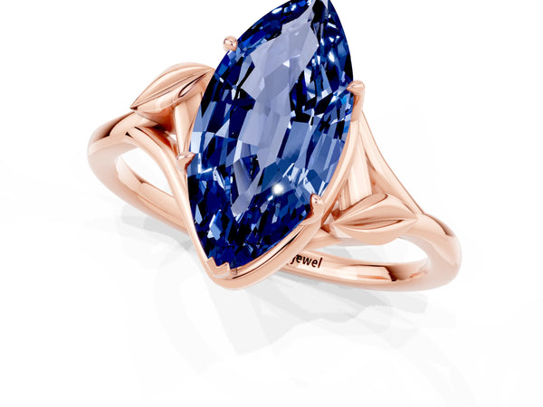 Rose gold Marquise Cut Blue Sapphire Solitaire Ring with Twist Band and Four-Prong Setting