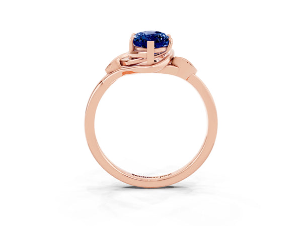 Rose gold Marquise Cut Blue Sapphire Solitaire Ring with Twist Band and Four-Prong Setting