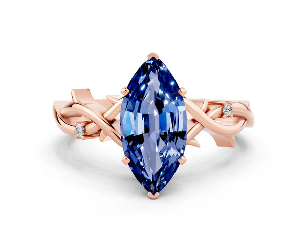 Rose gold Marquise Cut Blue Sapphire Solitaire Ring with Twisted Band and Prong Setting