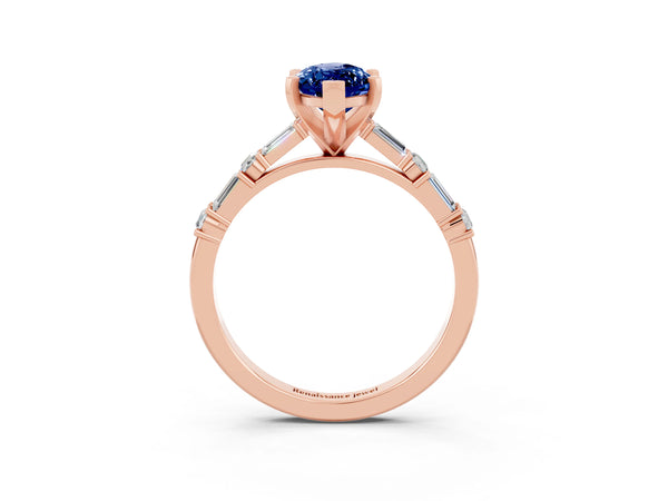 Rose gold Marquise Cut Blue Sapphire Solitaire with Side Baguettes and Channel Set Band