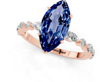 Rose gold Marquise Cut Blue Sapphire Solitaire with Side Stones on a Pavé Band and Four-Prong Setting_1