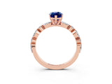 Rose gold Marquise Cut Blue Sapphire Solitaire with Side Stones on a Pavé Band and Four-Prong Setting_3