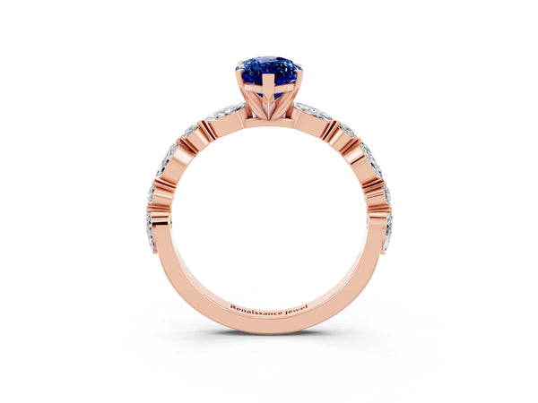 Rose gold Marquise Cut Blue Sapphire Ring with Marquise and Round  Side Stones and Four-Prong Setting