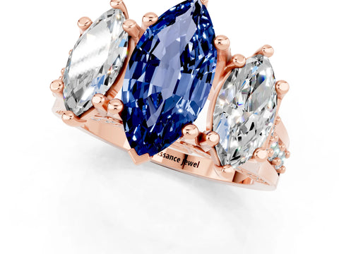 Rose gold Marquise Cut Blue Sapphire Three-Stone Ring with Channel Set Band and Four-Prong Setting_1