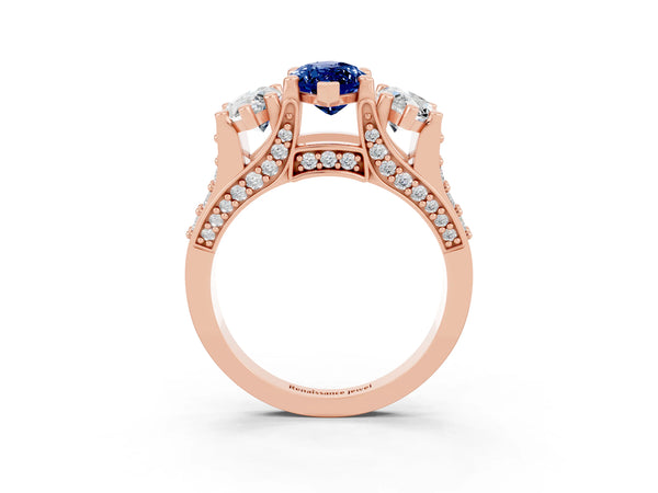 Rose gold Marquise Cut Blue Sapphire Three-Stone Ring with Channel Set Band and Four-Prong Setting