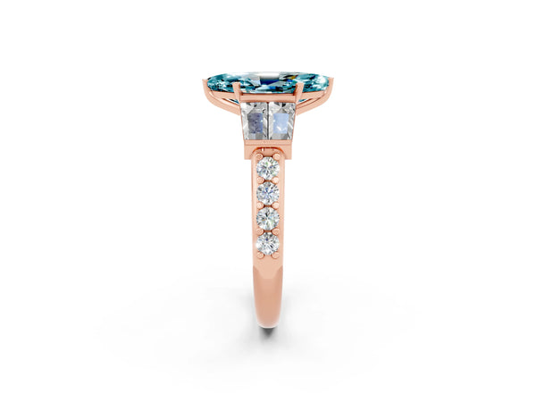 Rose gold Marquise Cut Blue Topaz Engagement Ring with Baguette Side Stones and Channel Set Band