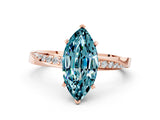 Rose gold Marquise Cut Blue Topaz Engagement Ring with Side Stone Accents and Four-Prong Setting_60