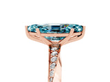 Rose gold Marquise Cut Blue Topaz Engagement Ring with Side Stone Accents and Four-Prong Setting_65