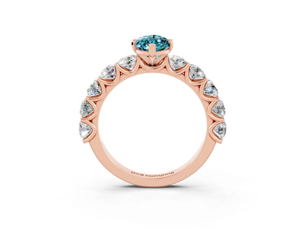 Rose gold Marquise Cut Blue Topaz Prong Setting with Side Stones on a Pave Band