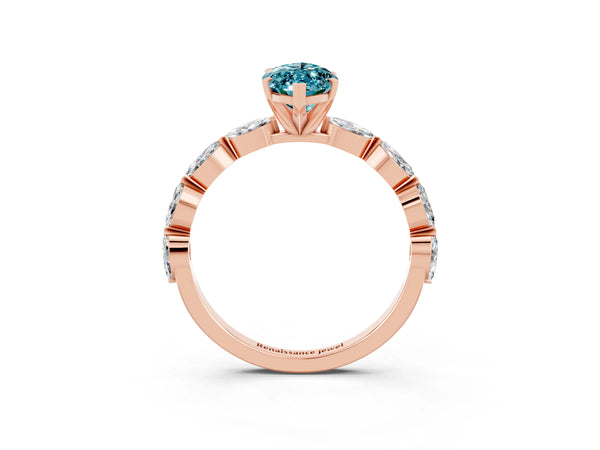 Rose gold Marquise Cut Blue Topaz Ring with Marquise Side Stones and Prong Setting