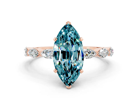 Rose gold Marquise Cut Blue Topaz Ring with Marquise Side Stones and Prong Setting