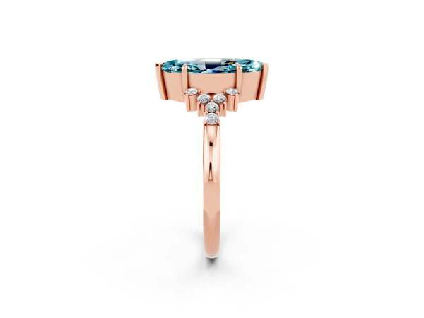 Rose gold Marquise Cut Blue Topaz Ring with Side Stones and Four-Prong Setting