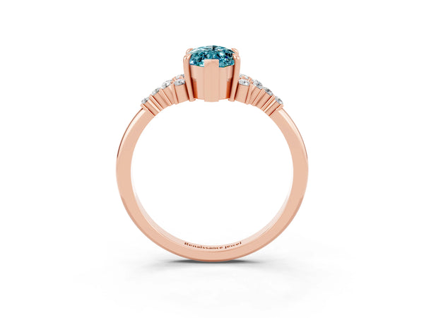 Rose gold Marquise Cut Blue Topaz Ring with Side Stones and Four-Prong Setting