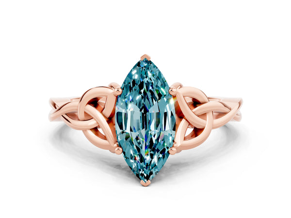 Rose gold Marquise Cut Blue Topaz Solitaire Engagement Ring with Celtic Knot Band and Four-Prong Setting