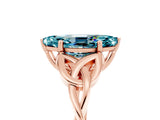 Rose gold Marquise Cut Blue Topaz Solitaire Engagement Ring with Celtic Knot Band and Four-Prong Setting_5