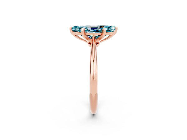 Rose gold Marquise Cut Blue Topaz Solitaire Engagement Ring with Classic Band and Four-Prong Setting