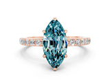 Rose gold Marquise Cut Blue Topaz Solitaire Engagement Ring with Pavé Band and Four-Prong Setting