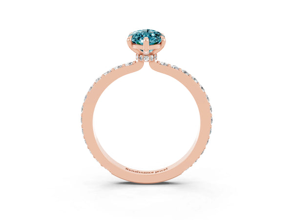 Rose gold Marquise Cut Blue Topaz Solitaire Engagement Ring with Pavé Band and Four-Prong Setting