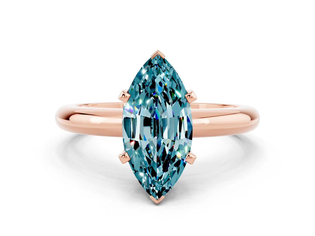 Rose gold Marquise Cut Blue Topaz Solitaire Engagement Ring with Round Band and Four-Prong Setting