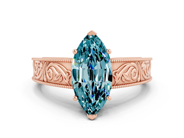 Rose gold Marquise Cut Blue Topaz Solitaire Ring with Engraved Band and Four-Prong Setting