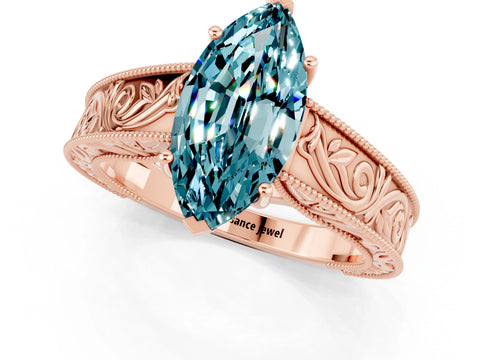 Rose gold Marquise Cut Blue Topaz Solitaire Ring with Engraved Band and Four-Prong Setting_1