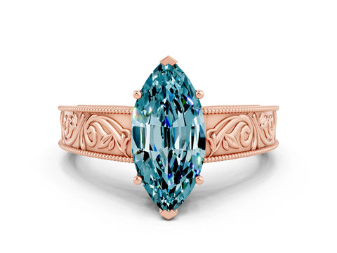 Rose gold Marquise Cut Blue Topaz Solitaire Ring with Engraved Band and Four-Prong Setting