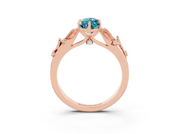 Rose gold Marquise Cut Blue Topaz Solitaire Ring with Leaf Motif Band and Four-Prong Setting