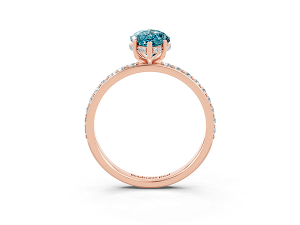 Rose gold Marquise Cut Blue Topaz Solitaire Ring with Pavé Band and Hidden Halo