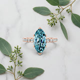 Rose gold Marquise Cut Blue Topaz Solitaire Ring with Round  Pavé Band and Four-Prong Setting_57