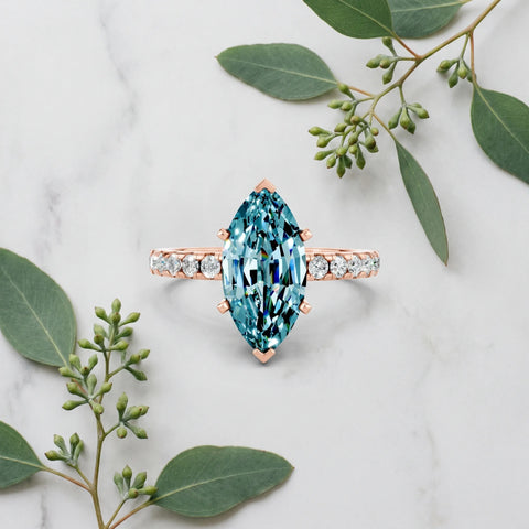 Rose gold Marquise Cut Blue Topaz Solitaire Ring with Round  Pavé Band and Four-Prong Setting_57