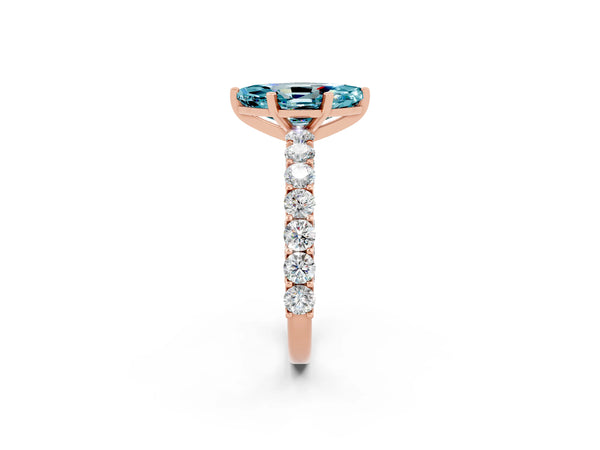 Rose gold Marquise Cut Blue Topaz Solitaire Ring with Shared Prong Pavé Band and Four-Prong Setting