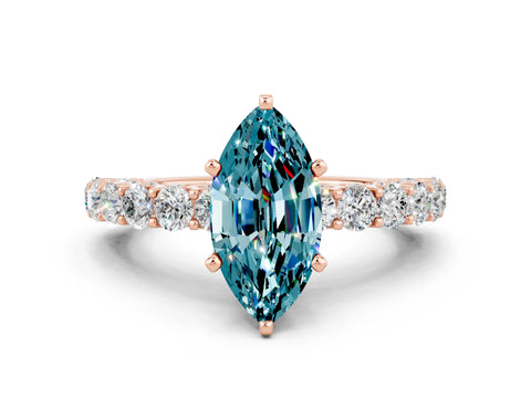 Rose gold Marquise Cut Blue Topaz Solitaire Ring with Shared Prong Pavé Band and Four-Prong Setting