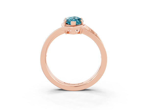 Rose gold Marquise Cut Blue Topaz Solitaire Ring with Split Shank and Prong Setting