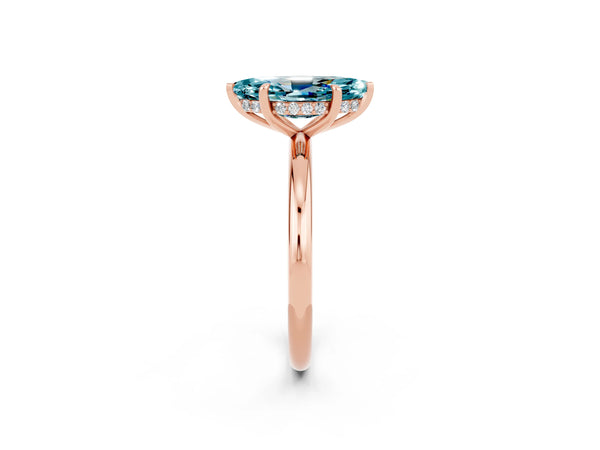 Rose gold Marquise Cut Blue Topaz Solitaire Ring with Thin Band and Four-Prong Setting