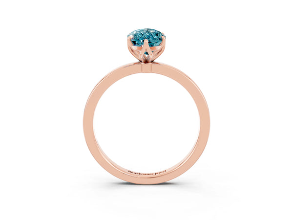 Rose gold Marquise Cut Blue Topaz Solitaire Ring with Thin Band and Prong Setting
