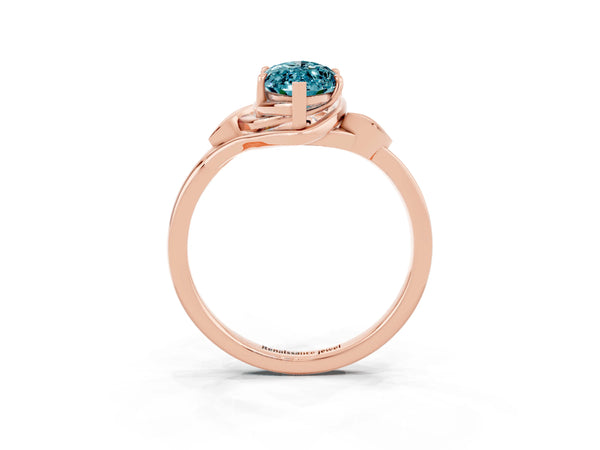 Rose gold Marquise Cut Blue Topaz Solitaire Ring with Twist Band and Four-Prong Setting