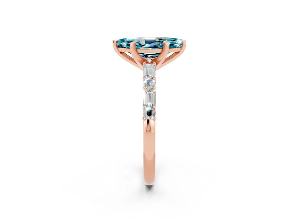 Rose gold Marquise Cut Blue Topaz Solitaire with Side Baguettes and Channel Set Band