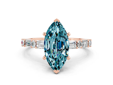 Rose gold Marquise Cut Blue Topaz Solitaire with Side Baguettes and Channel Set Band