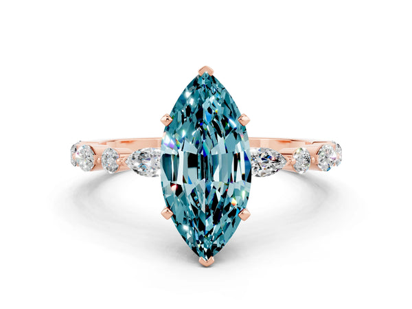 Rose gold Marquise Cut Blue Topaz Ring with Marquise and Round  Side Stones and Four-Prong Setting