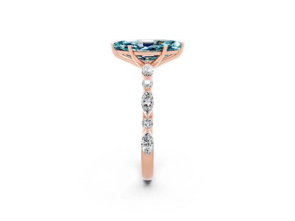 Rose gold Marquise Cut Blue Topaz Ring with Marquise and Round  Side Stones and Four-Prong Setting